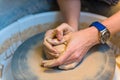 Pottering - creating a clay cup in process Royalty Free Stock Photo