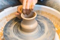 Pottering - creating a clay cup in process Royalty Free Stock Photo