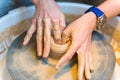 Pottering - creating a clay cup in process Royalty Free Stock Photo