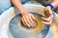Pottering - creating a clay cup in process Royalty Free Stock Photo