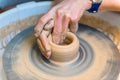 Pottering - creating a clay cup in process Royalty Free Stock Photo