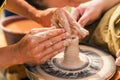Potters hands with the clay