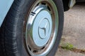 POTTERVILLE, MI - JUNE 23rd 2021: The front tire of a classic 1970 German car.