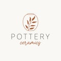 Pottery ceramics logo design. Vase and branch vector logotype.