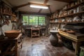 pottery and ceramics studio, with wheel, kiln, and tools for creating unique works of art