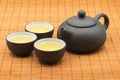 Pottery Chinese teapot and teacup with tea Royalty Free Stock Photo