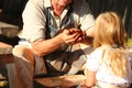 Pottery concept. A man is doing a pottery making workshop for a girl. Ancient technology and traditions of Old Church Slavonic