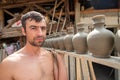 Pottery manufacturing , traditional handcraft workers in Romanian village of Horezu , Unesco heritage