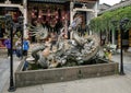 Pottery sculpture of dragon, carp and turtle in a fountain in the Cantonese Assembly Hall in Hoi An. Royalty Free Stock Photo