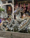 Pottery sculpture of dragon, carp and turtle in a fountain in the Cantonese Assembly Hall in Hoi An. Royalty Free Stock Photo