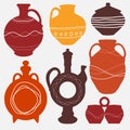 Pottery set with decor lines. Image of ceramic pots made of handmade clay