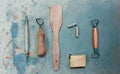 Pottery Tool Set on a Grunge Dirty Background. Top View. Toned Photo Royalty Free Stock Photo