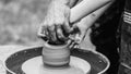 Pottery workshop outside. Potters and child hands. Family working on pottery wheel Royalty Free Stock Photo