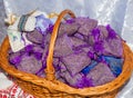 Pouch with lavender in a wooden basket. Fragrant bag of lavender flowers. Sprigs of lavender Royalty Free Stock Photo