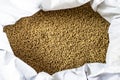 Poultry feed for chicken feed. Hens feed pellets, close up of granulated livestock food texture