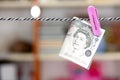 Pound banknotes clamped and hung Royalty Free Stock Photo