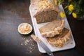 Pound nuts, almonds cake slices with frosting on top. Dark background, copy space. Sweet delicious food dessert. Top Royalty Free Stock Photo