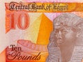 10 Pounds Egypt with the image of Pharaoh Ramses II and the pyramids. Polymer money of Egypt Royalty Free Stock Photo