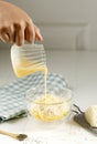 Pour Condensed Milk to the Bowl with Buttered Cheese Corn or Jagung Susu Keju