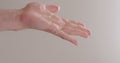 Pour shower gel on man hand closeup Royalty Free Stock Photo