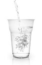 Pour water into a plastic cup Royalty Free Stock Photo