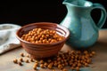 poured out roasted chickpeas from ceramic pitcher