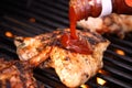 Pouring Barbeques Sauce on Chi Royalty Free Stock Photo