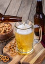 Pouring Beer into a Glass Mug Royalty Free Stock Photo