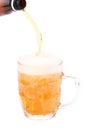 Pouring beer into mug isolated Royalty Free Stock Photo