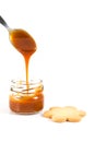 Pouring caramel in a small jar