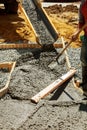 Pouring cement during Upgrade to residential street Royalty Free Stock Photo