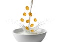 Pouring cereal into a bowl of milk creating a refreshing breakfast scene Royalty Free Stock Photo