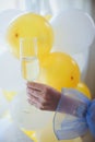 Pouring champagne in flutes standing on table Royalty Free Stock Photo