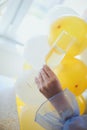 Pouring champagne in flutes standing on table Royalty Free Stock Photo