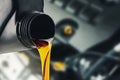 Pouring changing car engine oil Royalty Free Stock Photo
