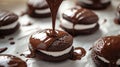 Pouring chocolate on whoopie pies with cream filling