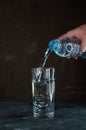 pouring water into a glass Royalty Free Stock Photo