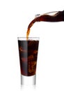 Pouring cola soda drink from bottle to glass Royalty Free Stock Photo