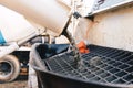 Pouring concrete from a concrete mixer to the pump - pouring con Royalty Free Stock Photo