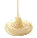 Pouring condensed milk Royalty Free Stock Photo