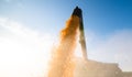 Pouring corn grain into tractor trailer Royalty Free Stock Photo