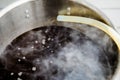 Pouring Craft Home Brew Beer Wort into the Boil Kettle