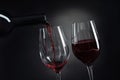 Pouring delicious red wine into glass Royalty Free Stock Photo