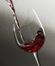 Pouring in a demaged wine glass Royalty Free Stock Photo