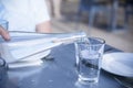 Pouring Distilled water into a clear glass at a restaurant