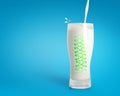 Pouring fresh milk in glass with strong spine on blue background. Healthy drink background. Royalty Free Stock Photo