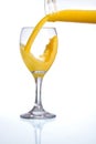 Pouring fresh orange juice Royalty Free Stock Photo