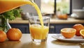 Pouring fresh orange juice into a glass with fresh fruits in background Royalty Free Stock Photo