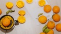 Pouring fresh orange juice. Squeezed orange parts on wooden board. Close up glass of fresh orange juice. Healthy and Royalty Free Stock Photo