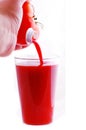 Pouring fresh tomato juice Royalty Free Stock Photo